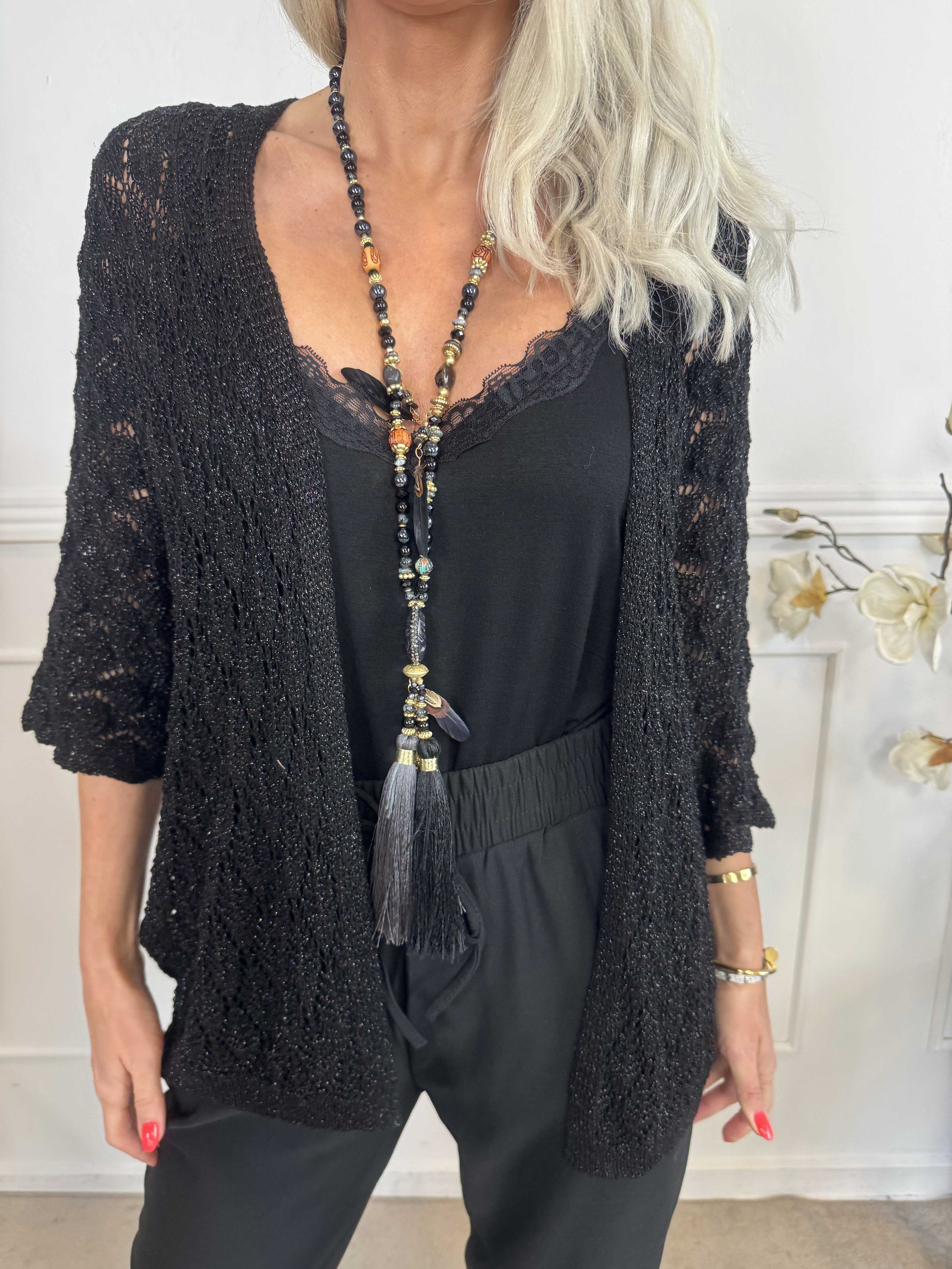 Selena - Söt virkad stickning med glittertrådar